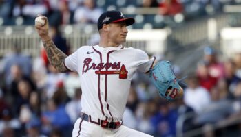 Atlanta Braves pitcher AJ Smith-Shawver throws during the first inning of a baseball game against the Cincinnati Reds, Monday, May 5, 2025, in Atlanta. (AP Photo/Butch Dill)